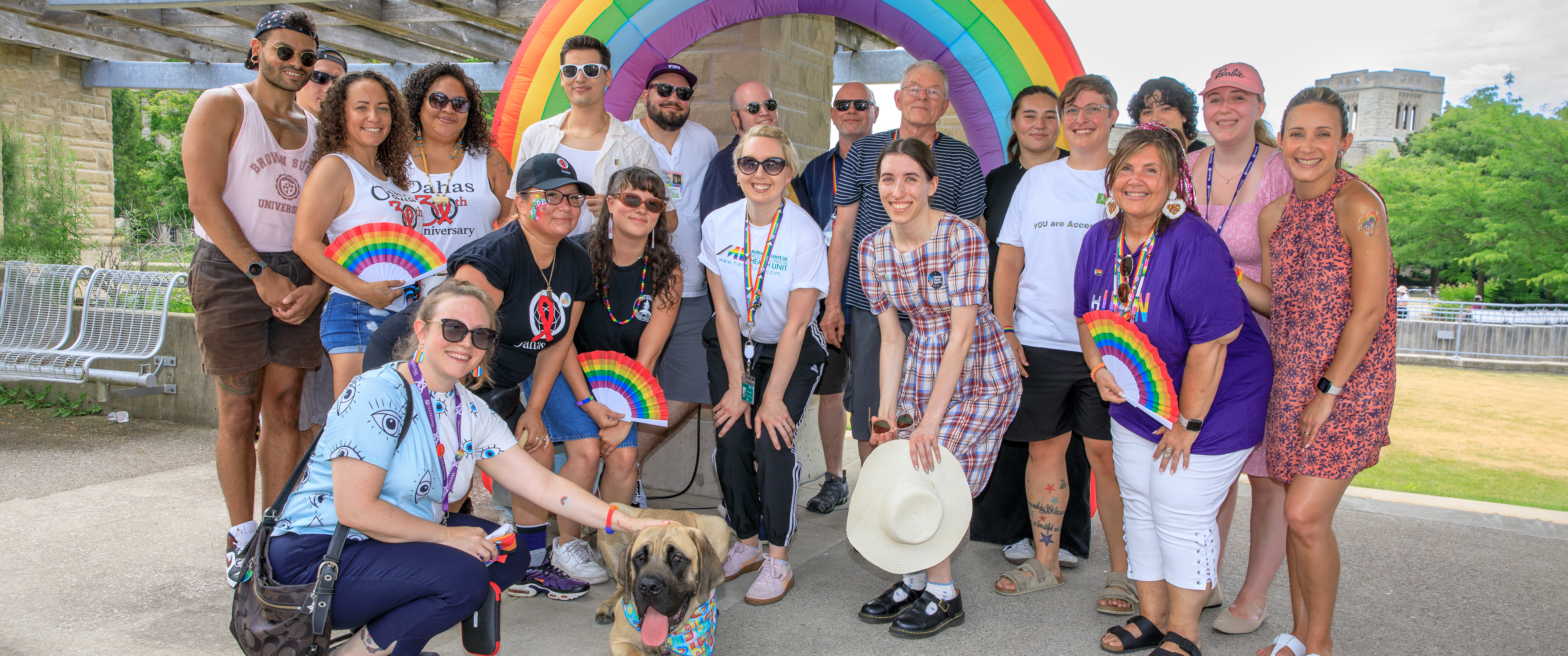 people standing together during Out at the beach, Pride event